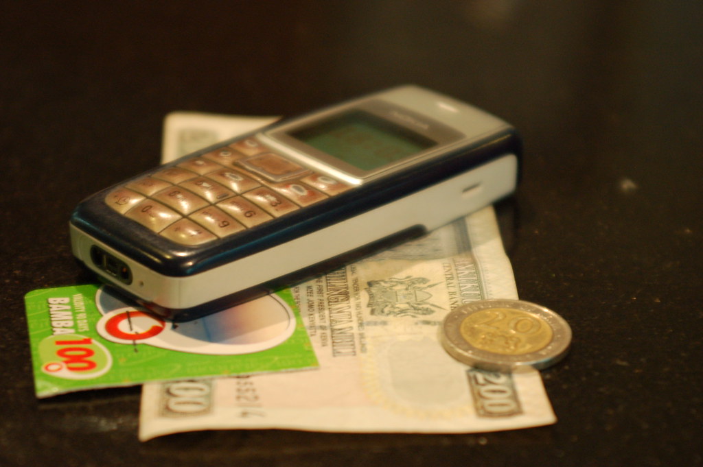 A person using a banking app on a smartphone