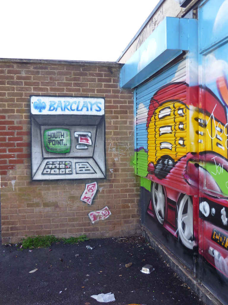A person using a bank ATM machine