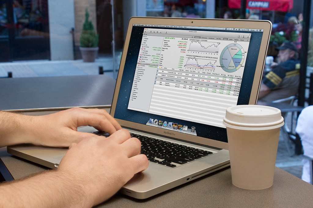 A screen displaying stock market price charts